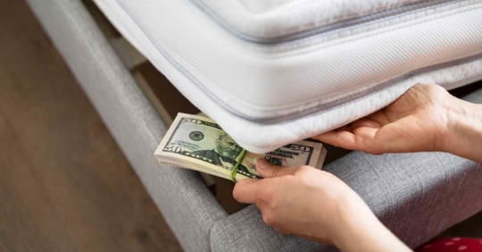 Someone hiding money under their mattress