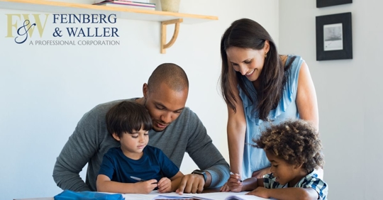 parents and their children at a table