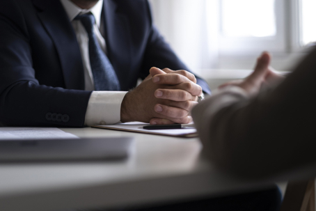 lawyer and client in a serious discussion