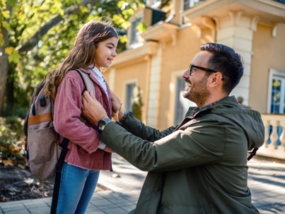 father and daughter outside