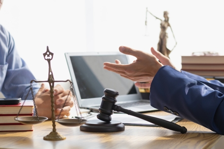 person talking with a lawyer