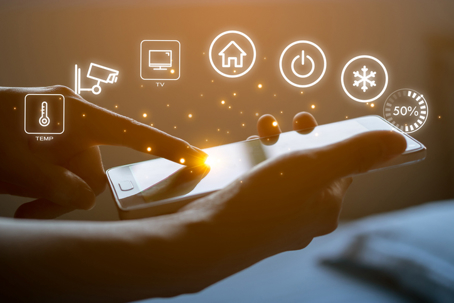 Person using their phone with smart home app